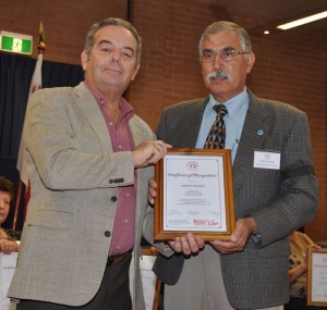 Joseph Fenech receiving the Certificate